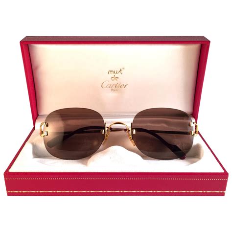 cartier mens glasses gold frame|authentic cartier glasses men.